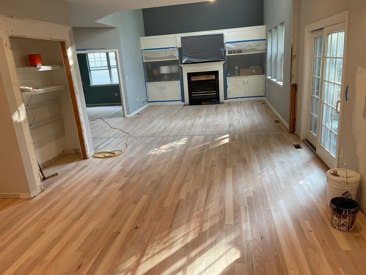 Living room sanded to bare wood